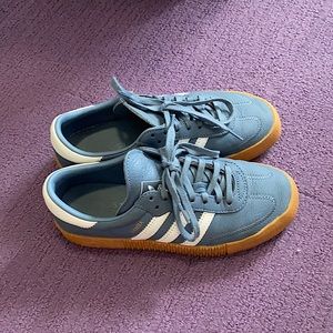 Blue and beige platform Adidas sambas.